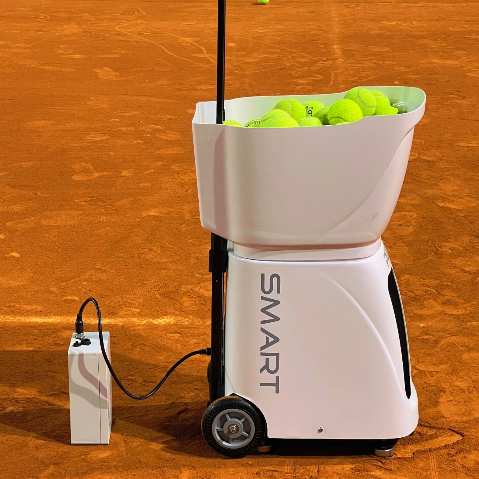 Portable tennis ball machine equipped with smart technology for customizable training sessions and remote control.